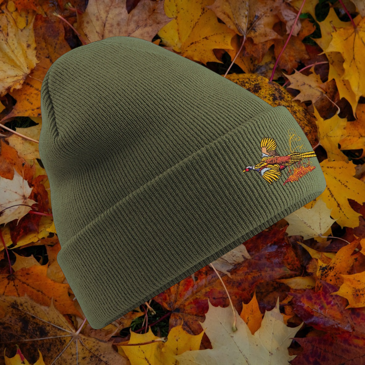 Unisex warm beanie hat with Pheasant embroidered logo.