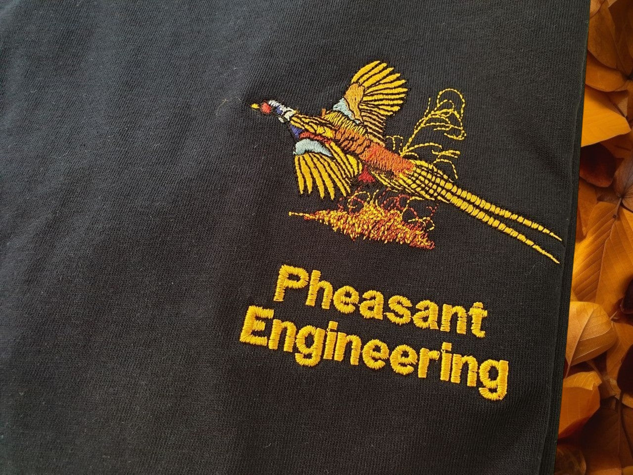 Unisex Premium T Shirt with Pheasant embroidery suitable for work and leisure.