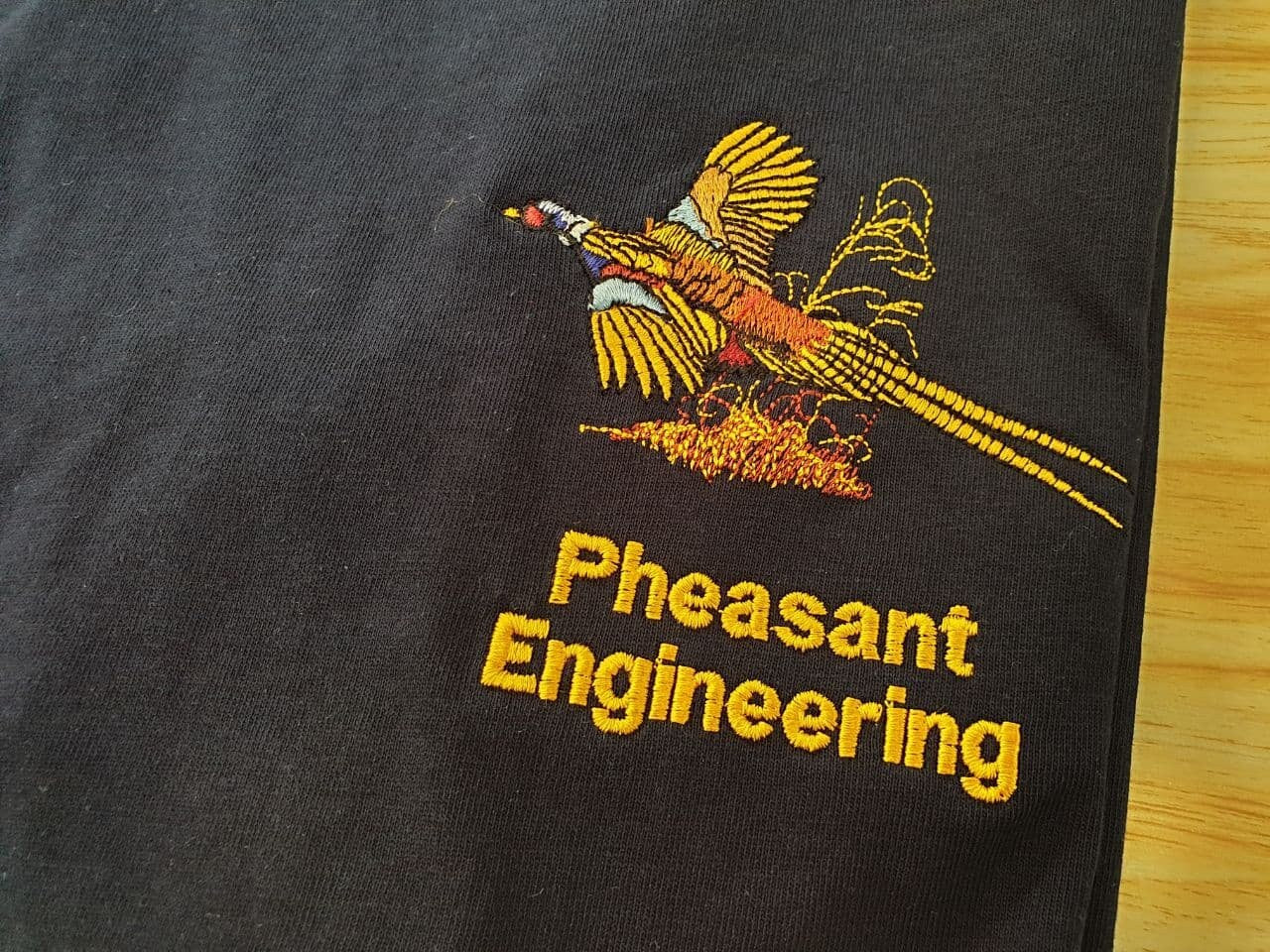 Unisex Premium T Shirt with Pheasant embroidery suitable for work and leisure.